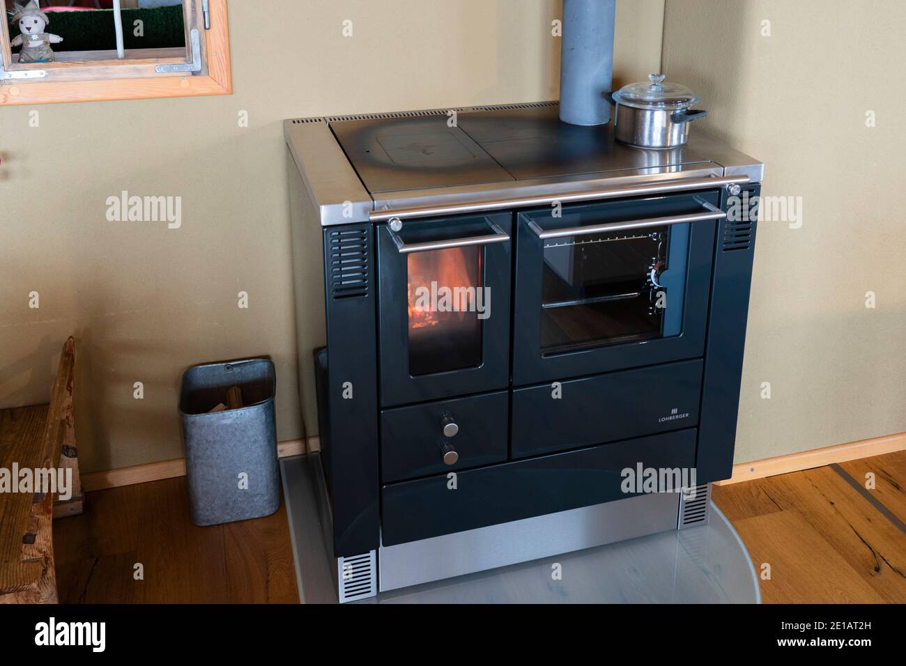 Traditional wood burning ovens are popular in Austria and are used for  cooking and heating, and sometimes used as a backup in case of a power cut  Stock Photo - Alamy