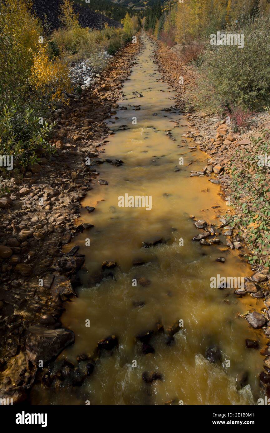 Acid mine drainage in Red Mountain Creek in SW Colorado Stock Photo