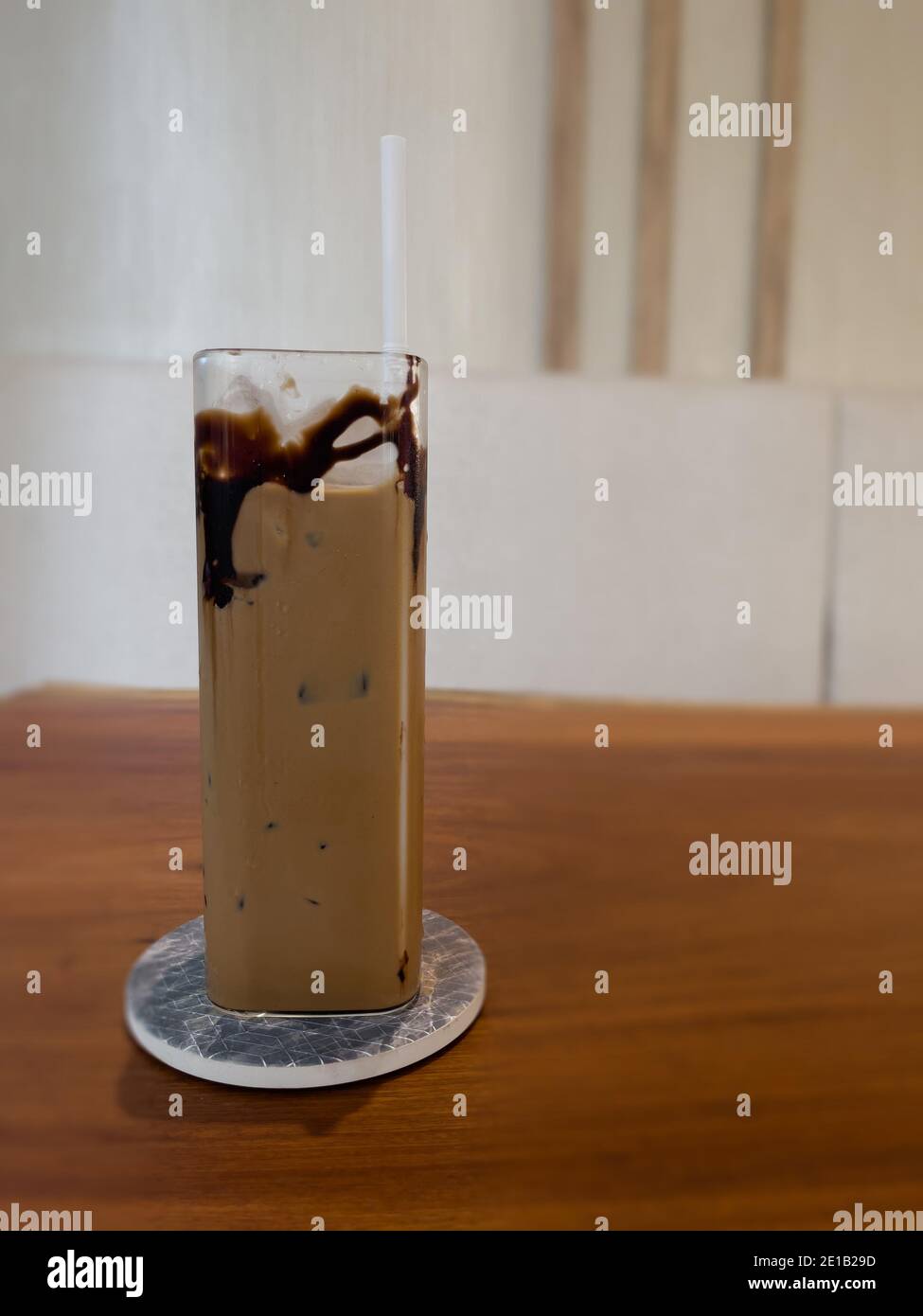 Iced coffee on wooden table, stock photo Stock Photo