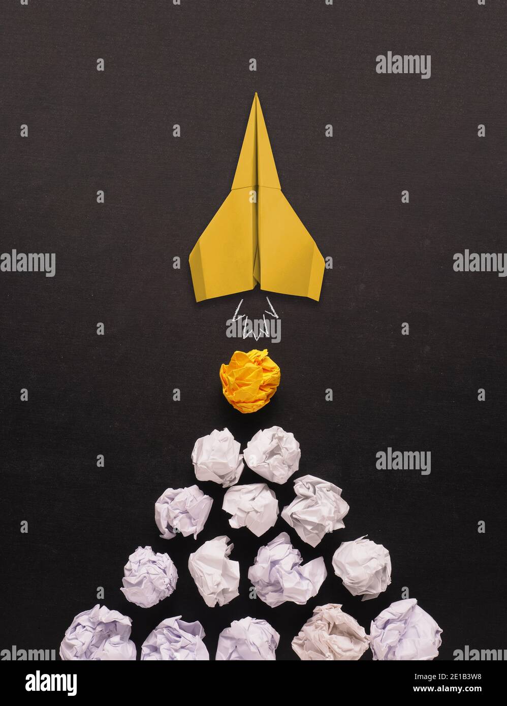 Launching paper rocket with jet stream of paper balls, creativity ...