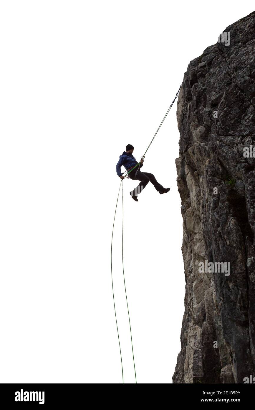Silhouette rappelling from cliff hi-res stock photography and images ...
