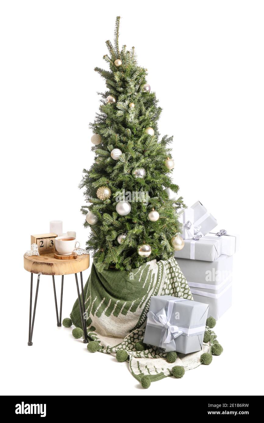 Beautiful decorated Christmas tree with gift boxes on white background ...