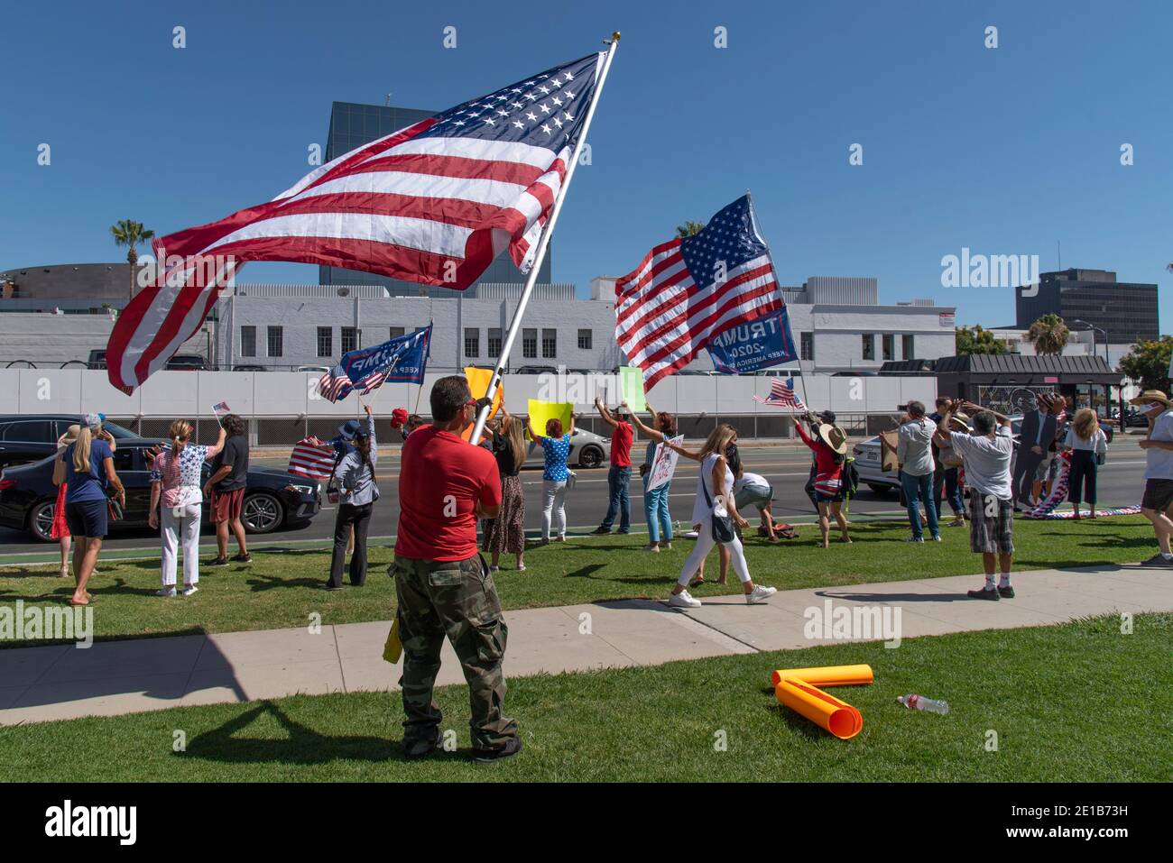 Beverly Hills, CA/USA - Aug 1, 2020: American flags and Trump banners ...