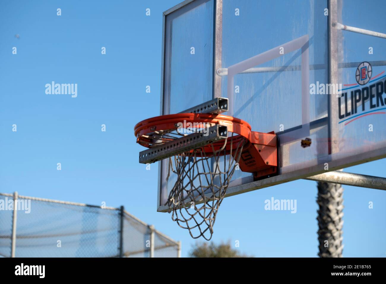 los-angeles-ca-usa-december-19-2020-a-basketball-hoop-is-blocked-with-metal-bars-to-prevent-use-of-the-basketball-court-during-quarantine-2E1B765.jpg