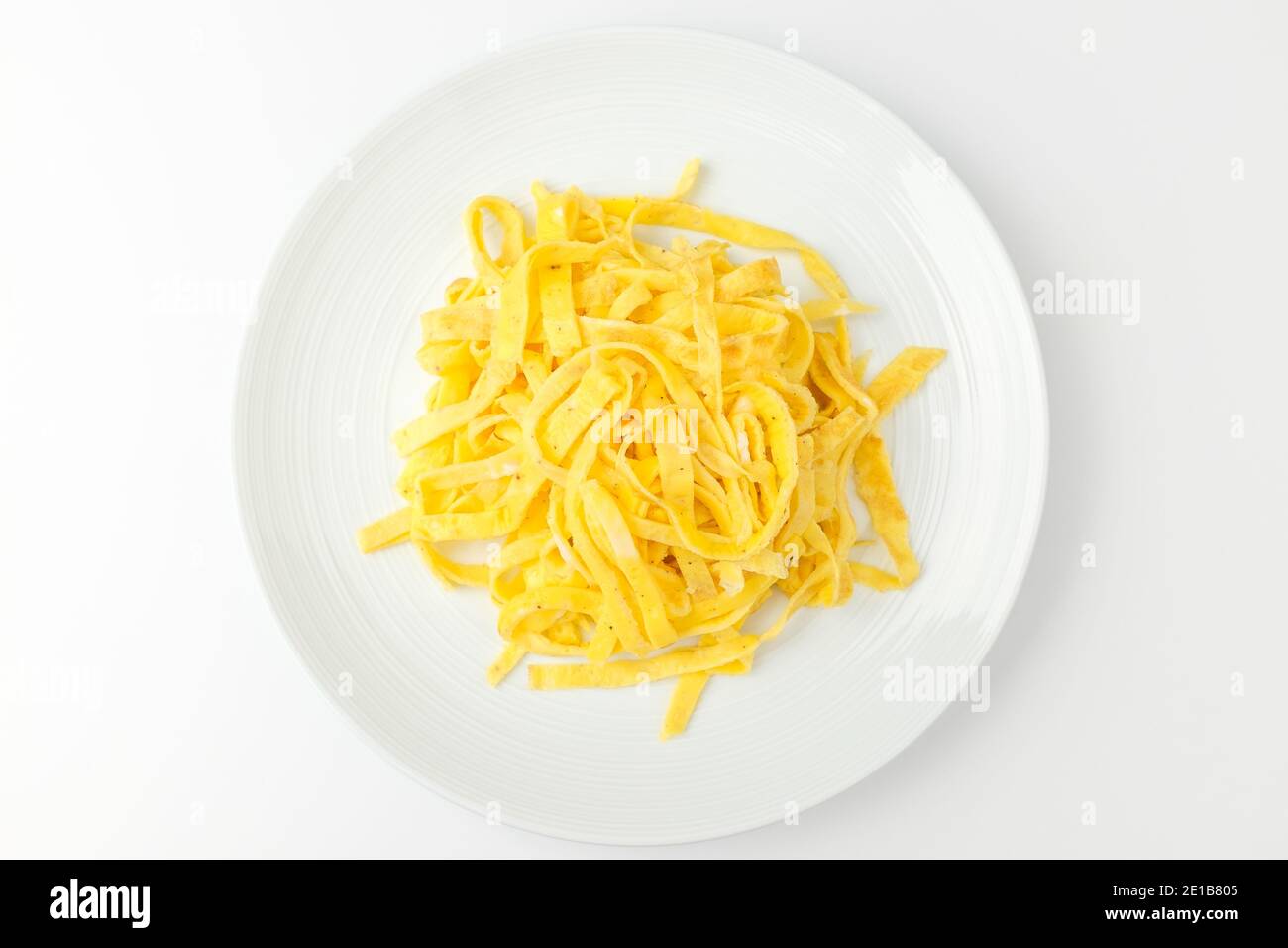 Garnish for cooking. Decorative dishes made of eggs. Sliced egg Stock Photo