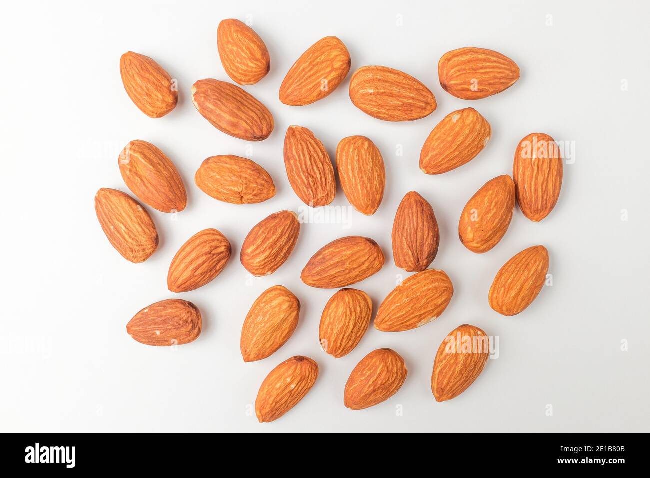 Savory almonds on white background Stock Photo