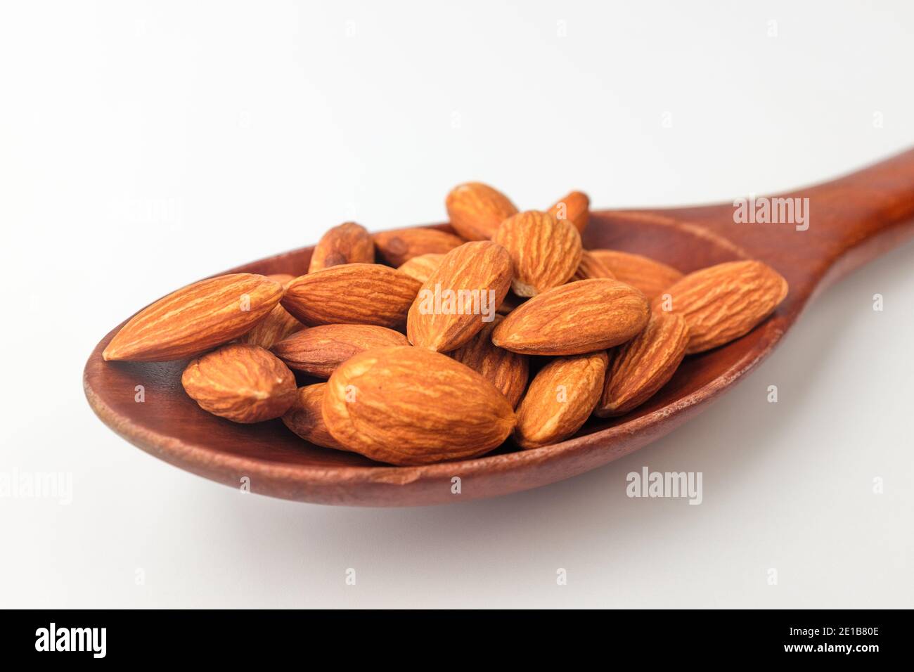 Savory almonds on white background Stock Photo