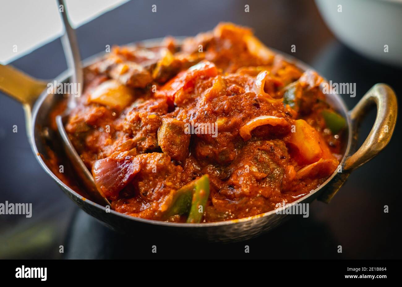 Kadai Mushroom, a delicious dish made of sautéed button mushrooms, onions, bell peppers in a