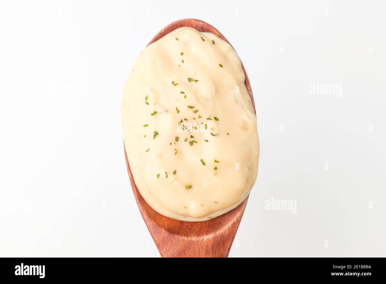 Cream sauce on white background Stock Photo Alamy