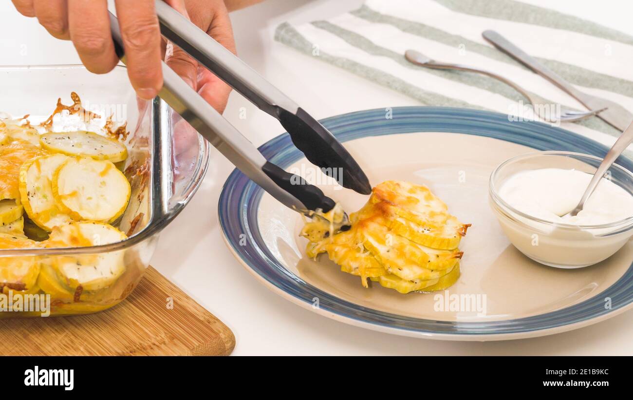 Baked Zucchini Recipe Zucchini Slices With Seasoning Salt Black Pepper And Cheese Served With Sour Cream Low Carbs Easy Cheesy Zucchini Bake Reci Stock Photo Alamy