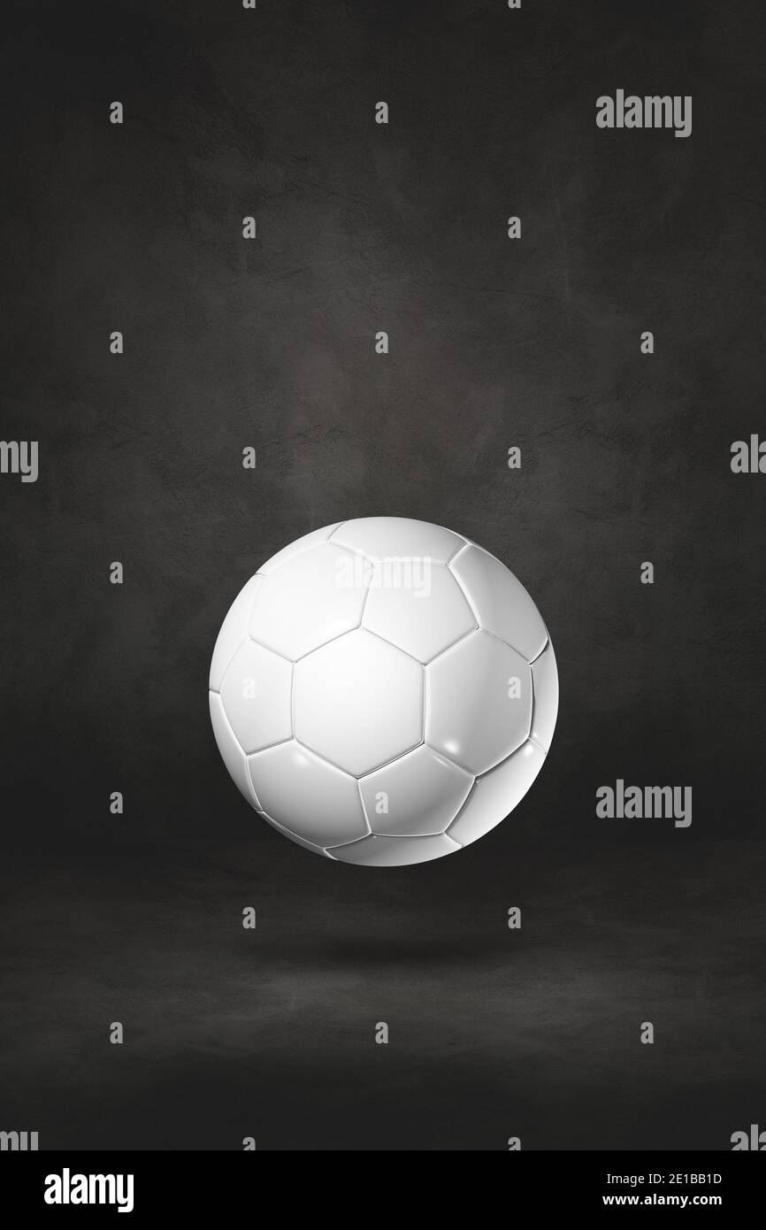 White soccer ball isolated on a black studio background. 3D ...