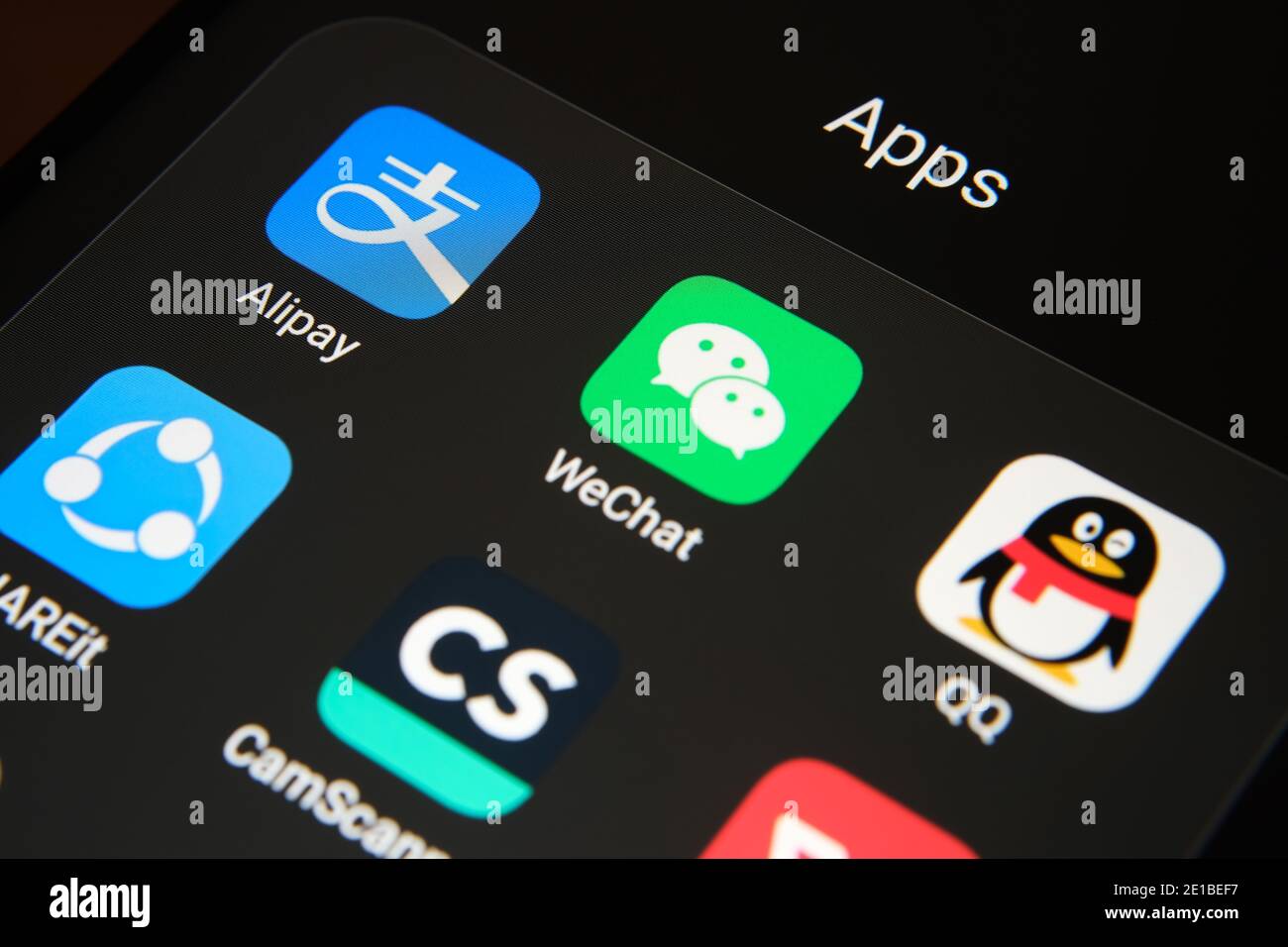 Stafford, United Kingdom - January 6 2021: Alipay, WeChat, QQ, SHAREit, CamScanner, WPS Office apps seen on the screen of smartphone. Banned Chinese a Stock Photo
