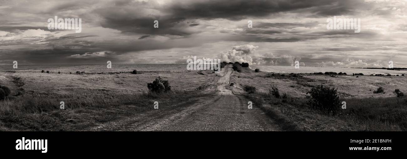Black and white landscape with road and clouds hi-res stock photography ...