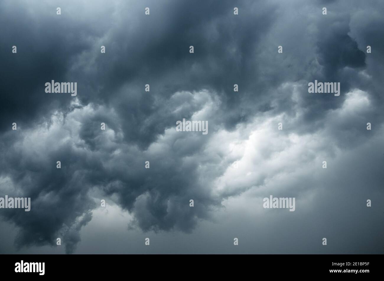 Background of dark stormy ominous clouds in gray moody sky Stock Photo ...