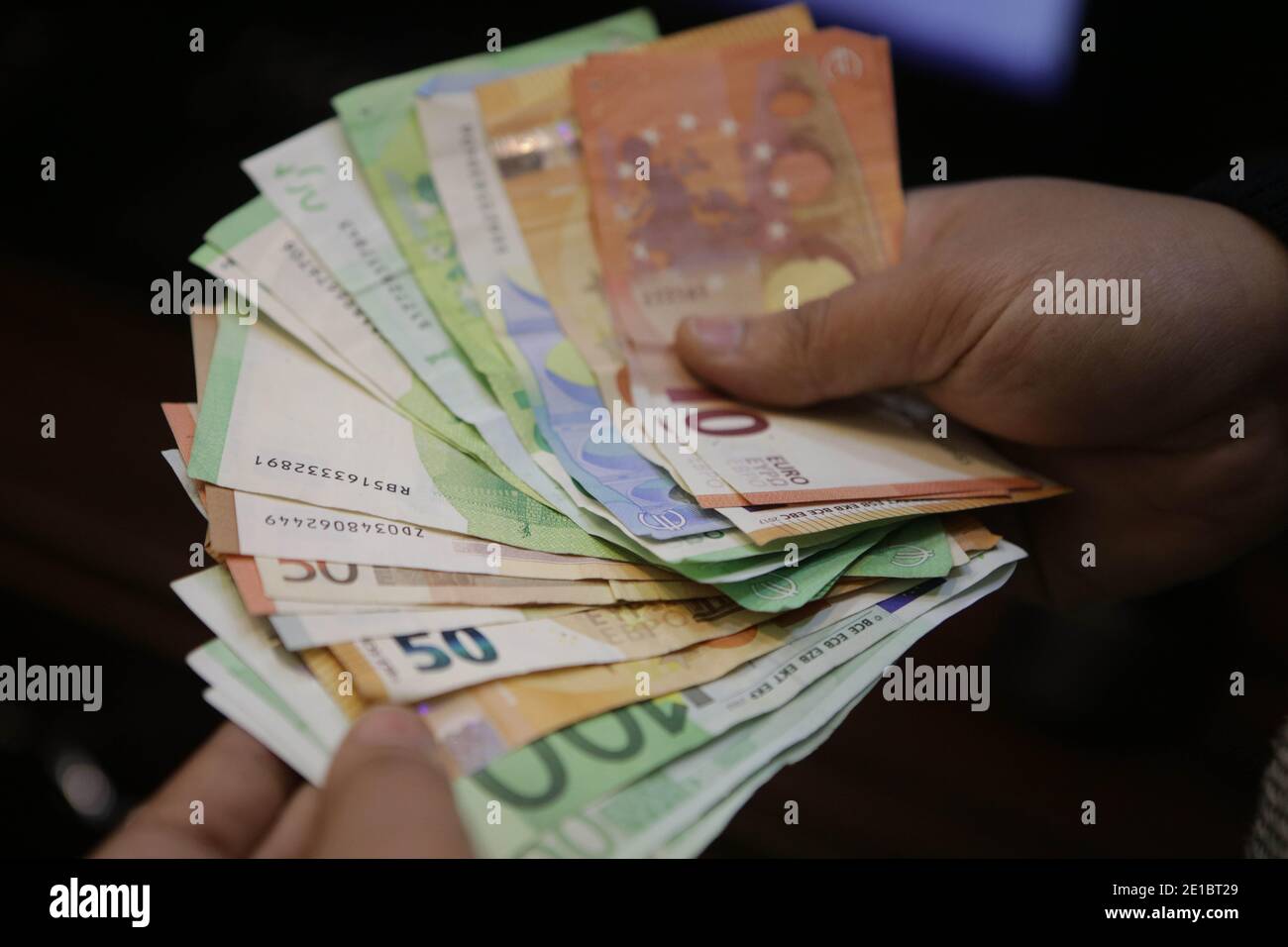 Gaziantep, Southeast Anatolia, Turkey. 22nd Dec, 2020. Gaziantep, Turkey. A  money changer employee shows Euro banknotes in different denominations at a  Bureau de Change store in Gaziantep, Turkey. The Euro banknotes are