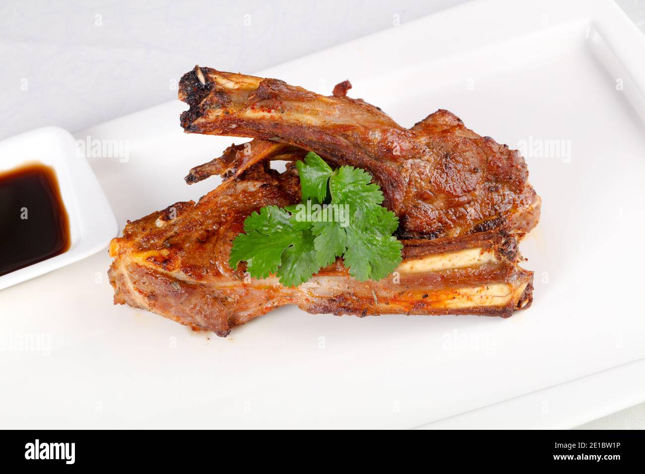 Roasted lamb with coriander leaves Stock Photo Alamy