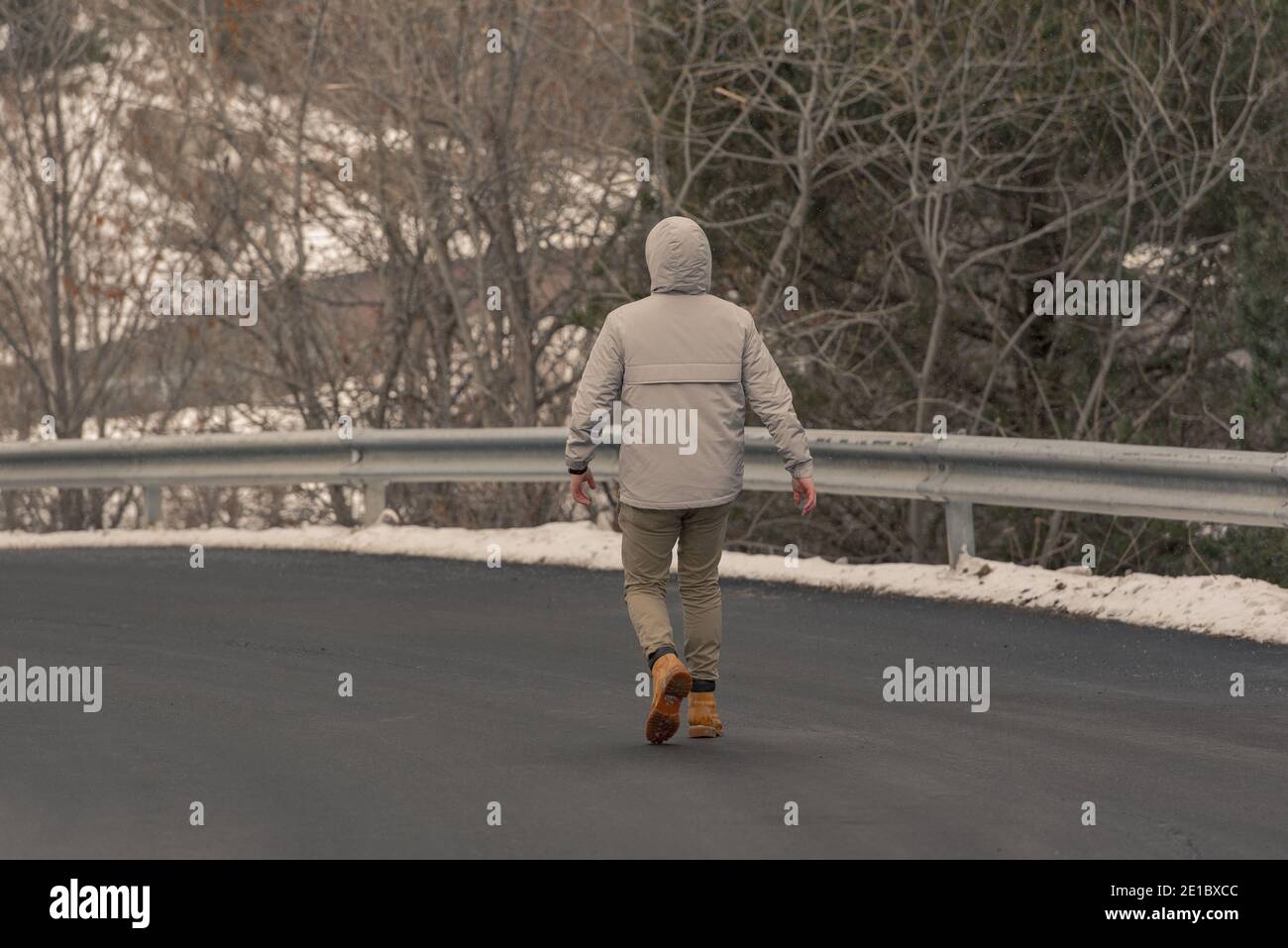 Young man winter clothes walks hi-res stock photography and images - Alamy