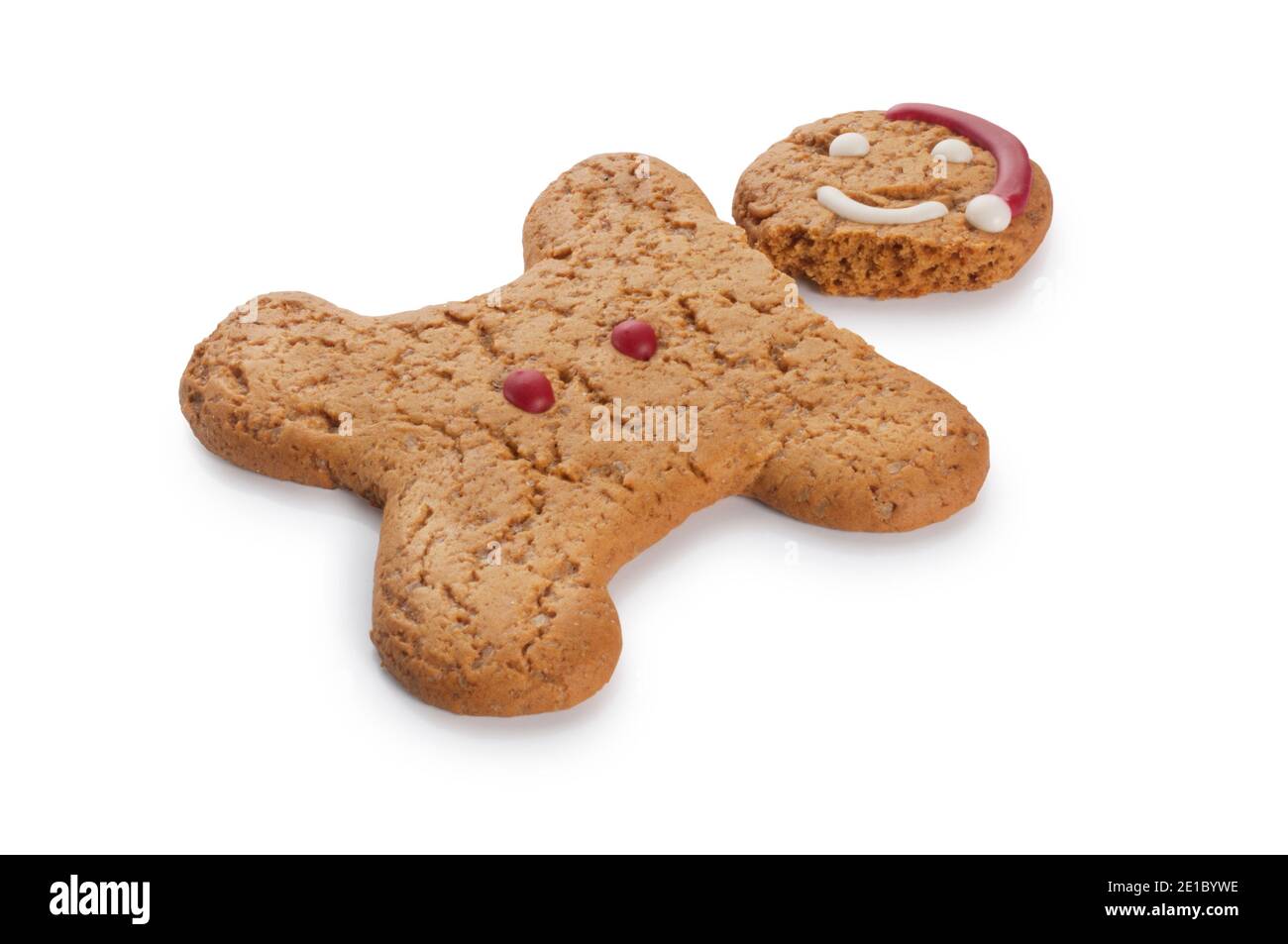 Studio shot of a decapitated gingerbread man cut out against a white background - John Gollop Stock Photo