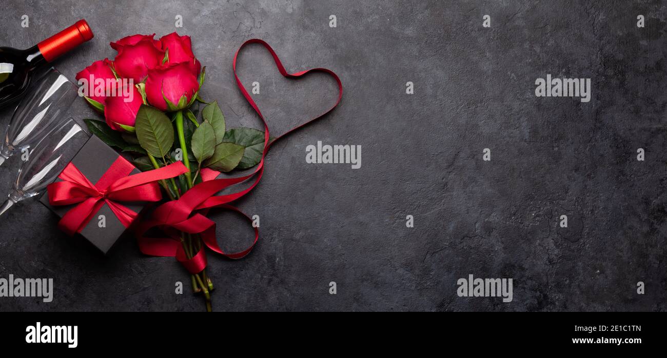 Valentines day greeting card with red rose flowers bouquet, wine and ...