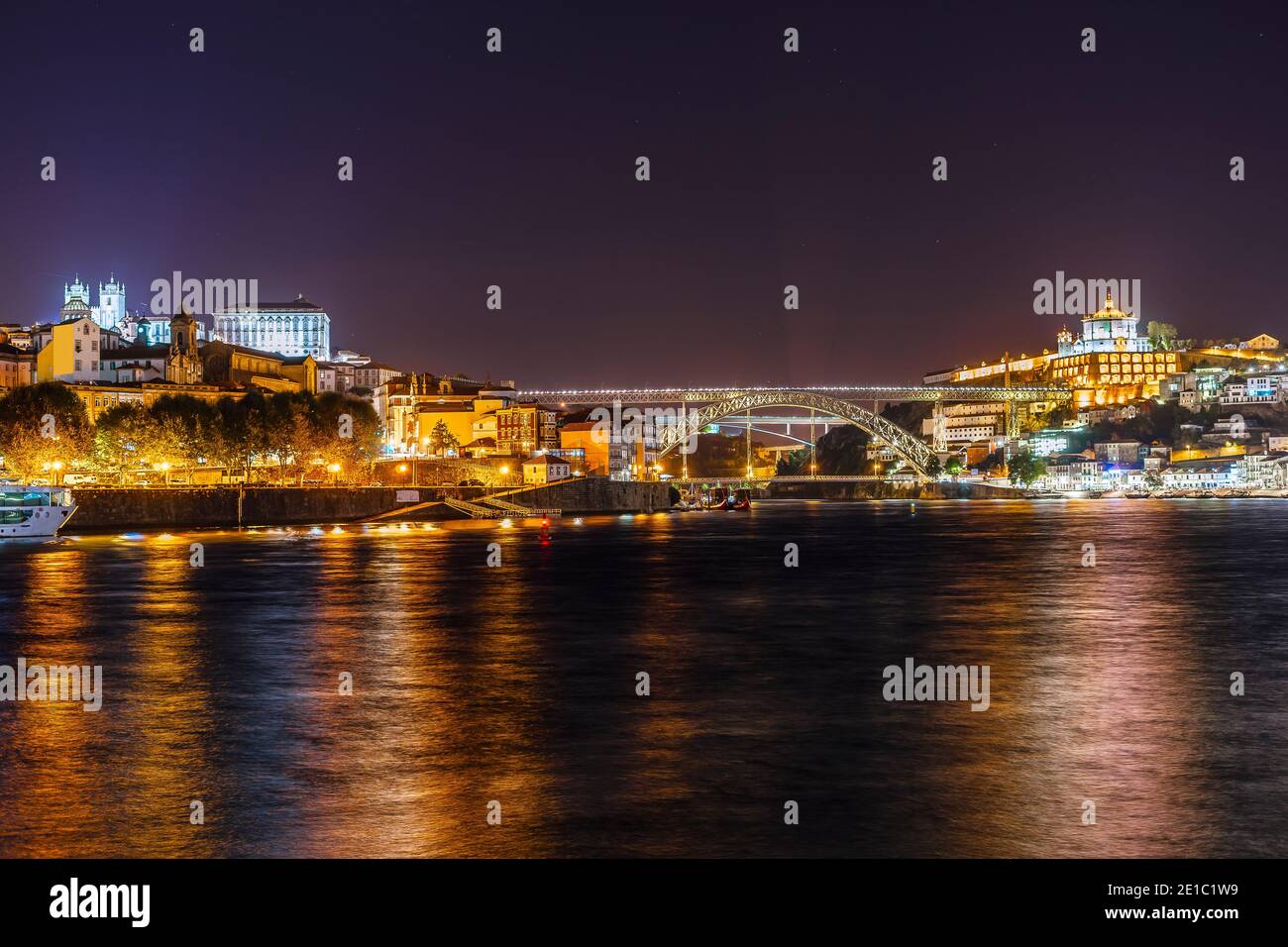 Nightscape of Porto and Vila Nova da Gaia with bridge over Douro river, Portugal Stock Photo