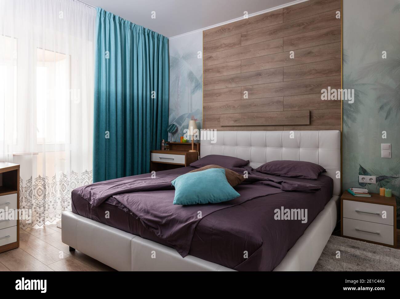 Modern bedroom in green-beige colors Stock Photo - Alamy