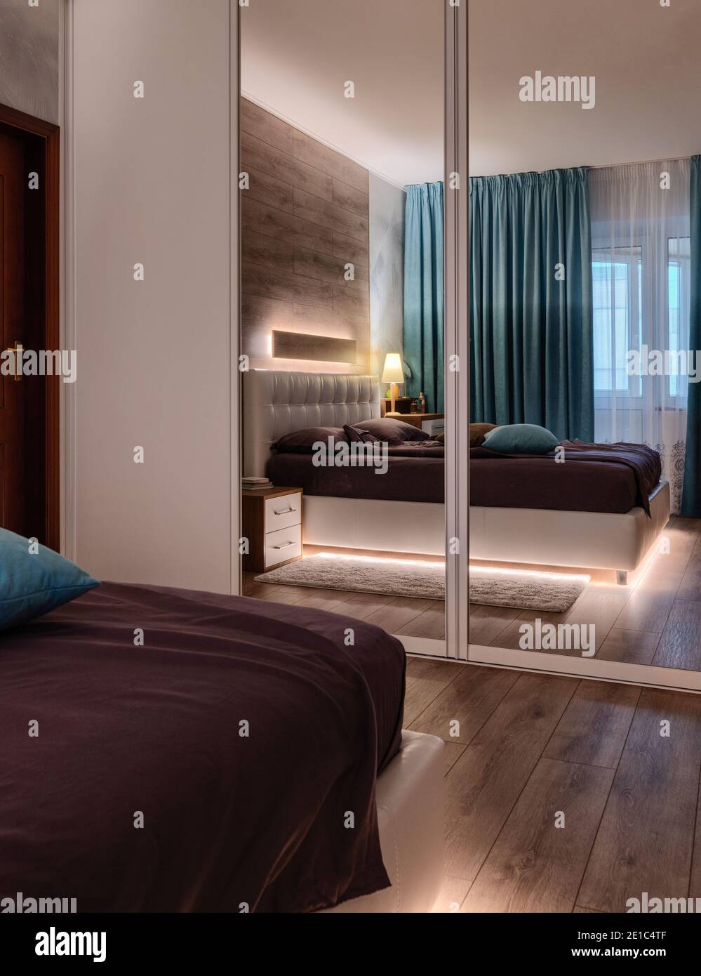 Bedroom interior, modern lighting design Stock Photo - Alamy