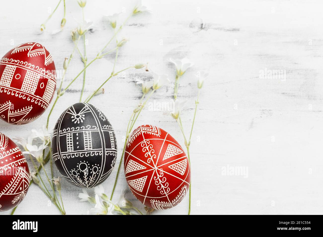 Red and black handmade Easter Pysanka eggs. Ukrainian pysanky decorated ...