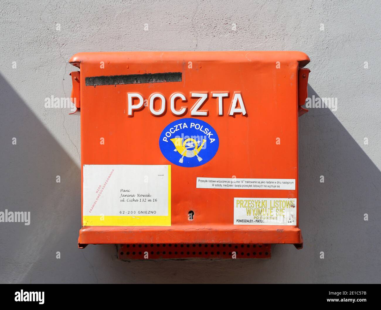 WARSAW,POLAND-MAY 16: Polish National Post red mailbox on the street of Warsaw. Polish postal service was established in 1558.May 16,2015 in Warsaw. Stock Photo