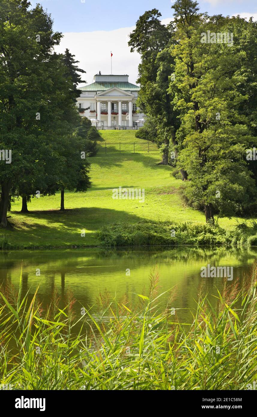 View of Belweder (Palac Belwederski) from Royal Baths park (Lazienki park) in Warsaw. Poland Stock Photo