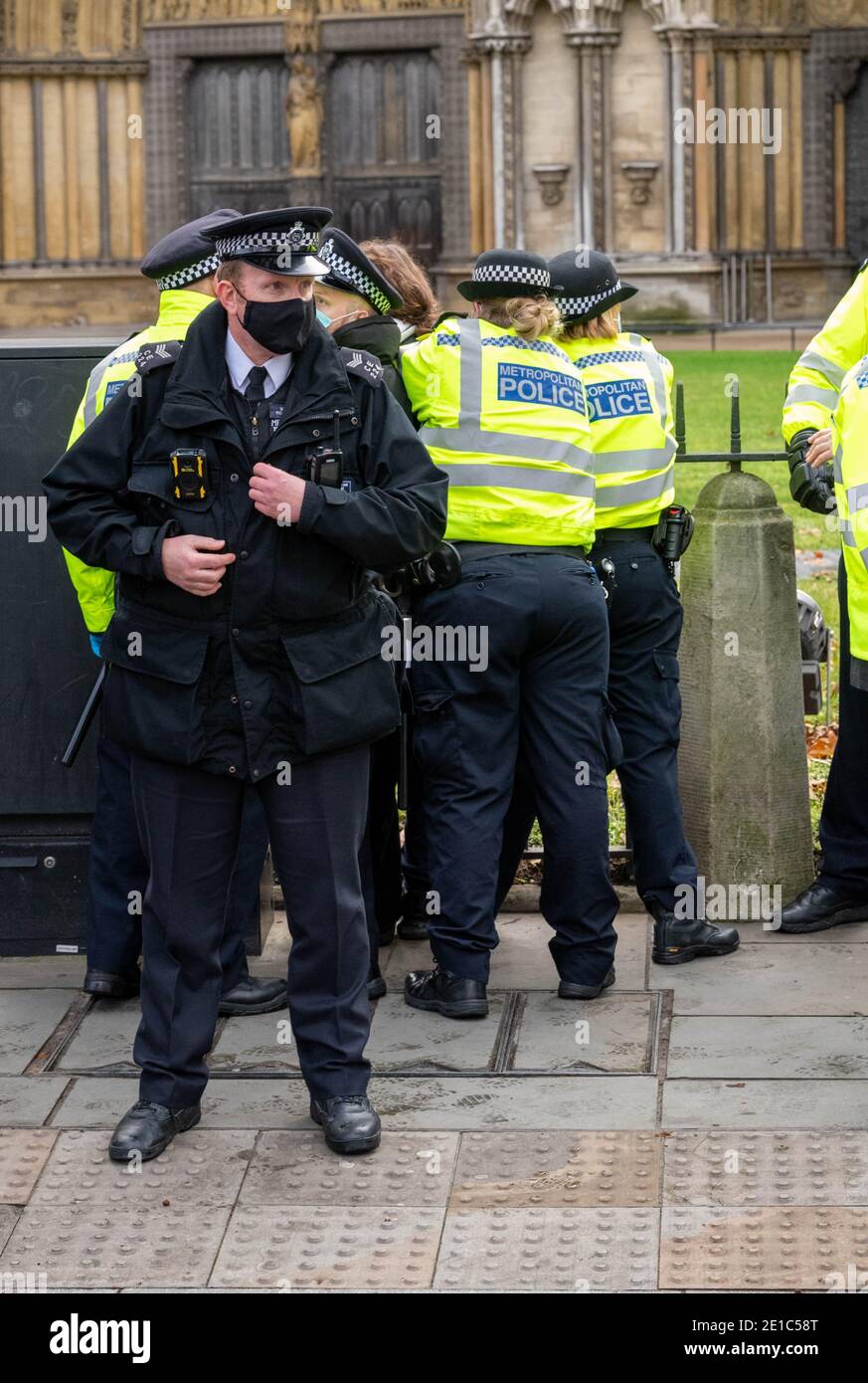 London, UK. 6th Jan, 2021. Small groups of anti lockdown protesters were in Parliament Square for the one day recall of the UK Parliament. Metropolitan police arrested many demonstrators using the lockdown regulations. Credit: Ian Davidson/Alamy Live News Stock Photo