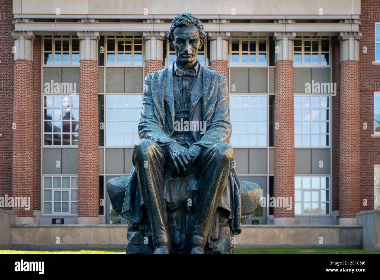 A statue of a young Abraham Lincoln sits in a courtyard on the campus of Syracuse University in Syracuse, New York. Stock Photo