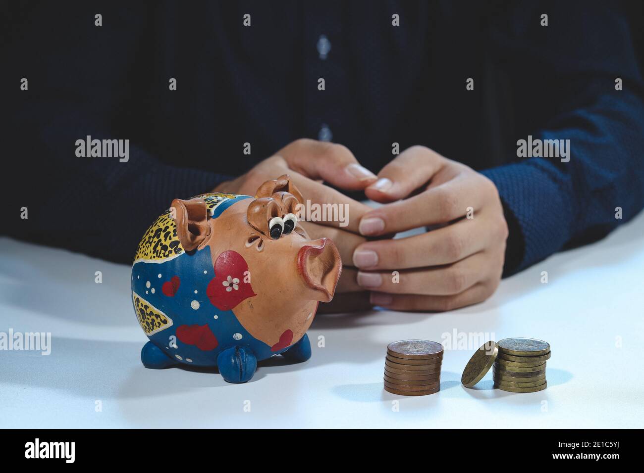 mortgage broker shows his client how much a mortgage will cost him per