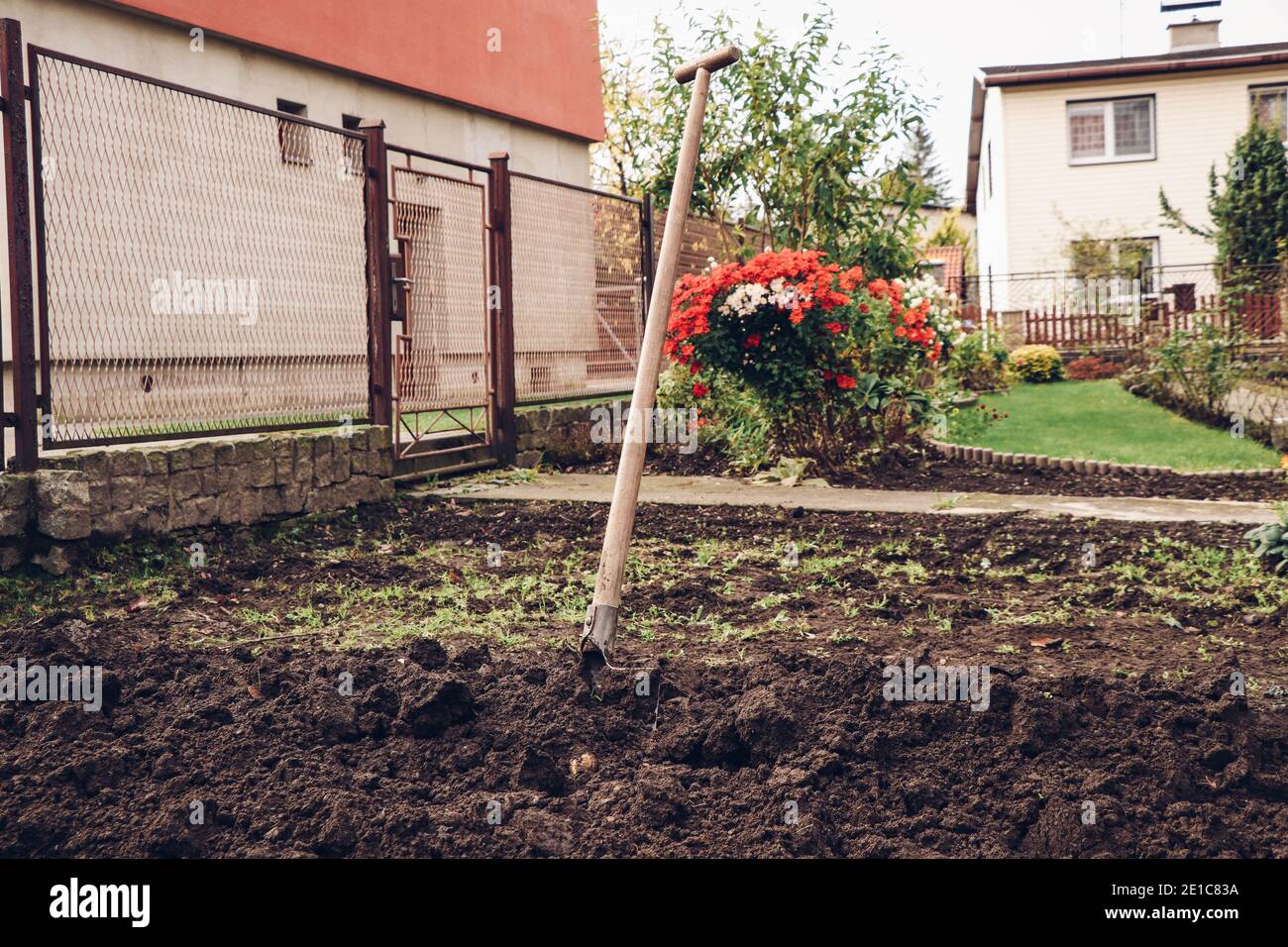 spade stuck in the dirt as a symbol of victory over a difficult task ...