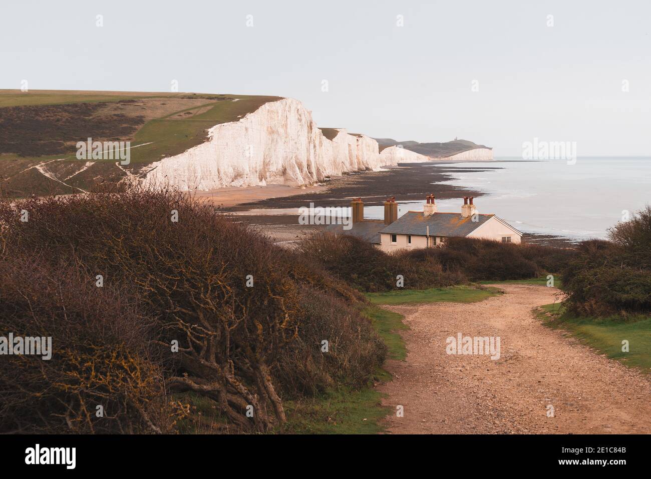 Seven Sisters famous cliffs and road to coast guard cottages, Eastbourne, East Sussex, England Stock Photo