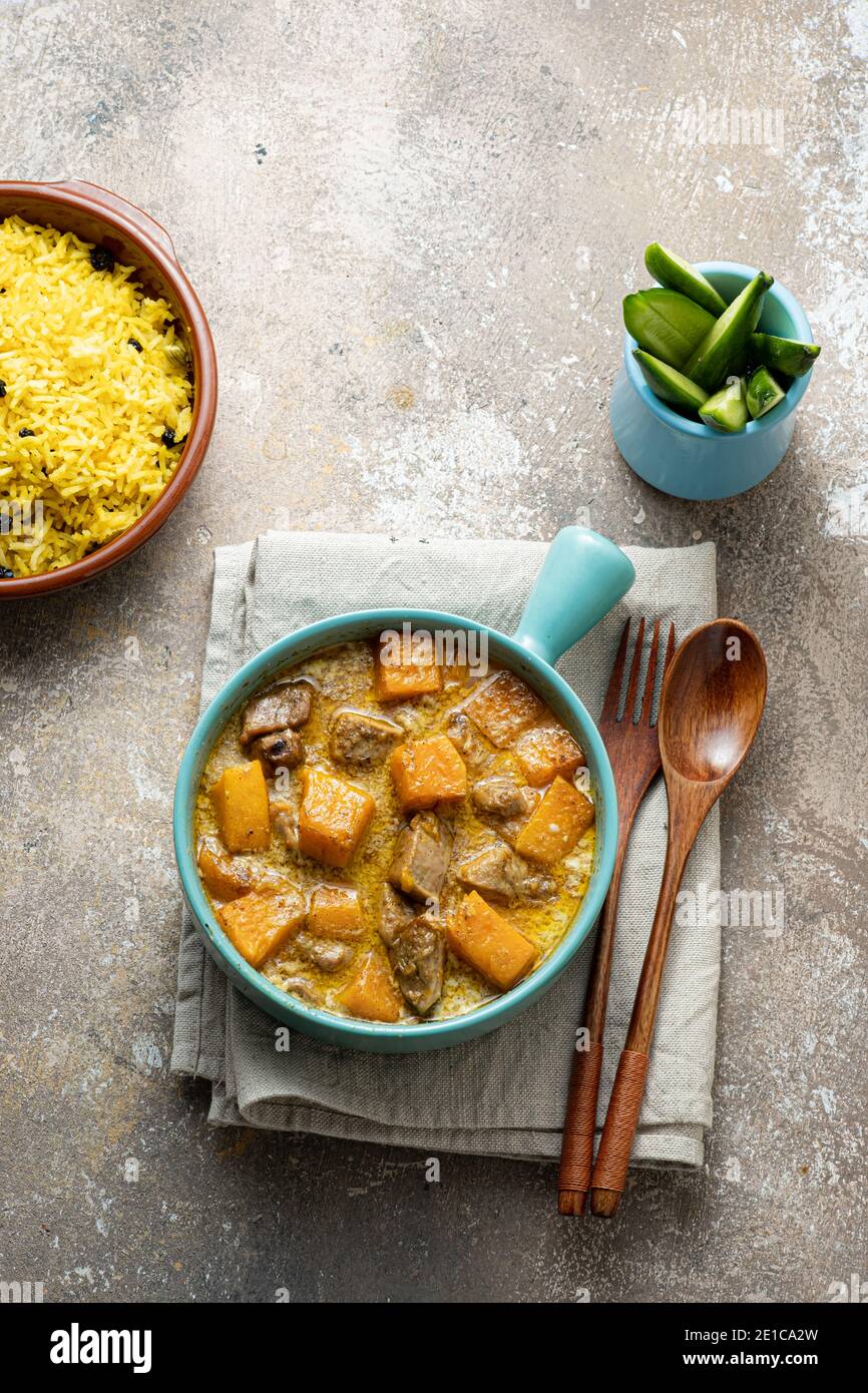 Pumpkin curry with chicken with rice biriani, copy space Stock Photo