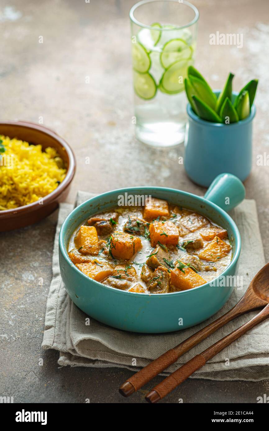 Pumpkin curry with chicken with rice biriani, copy space Stock Photo