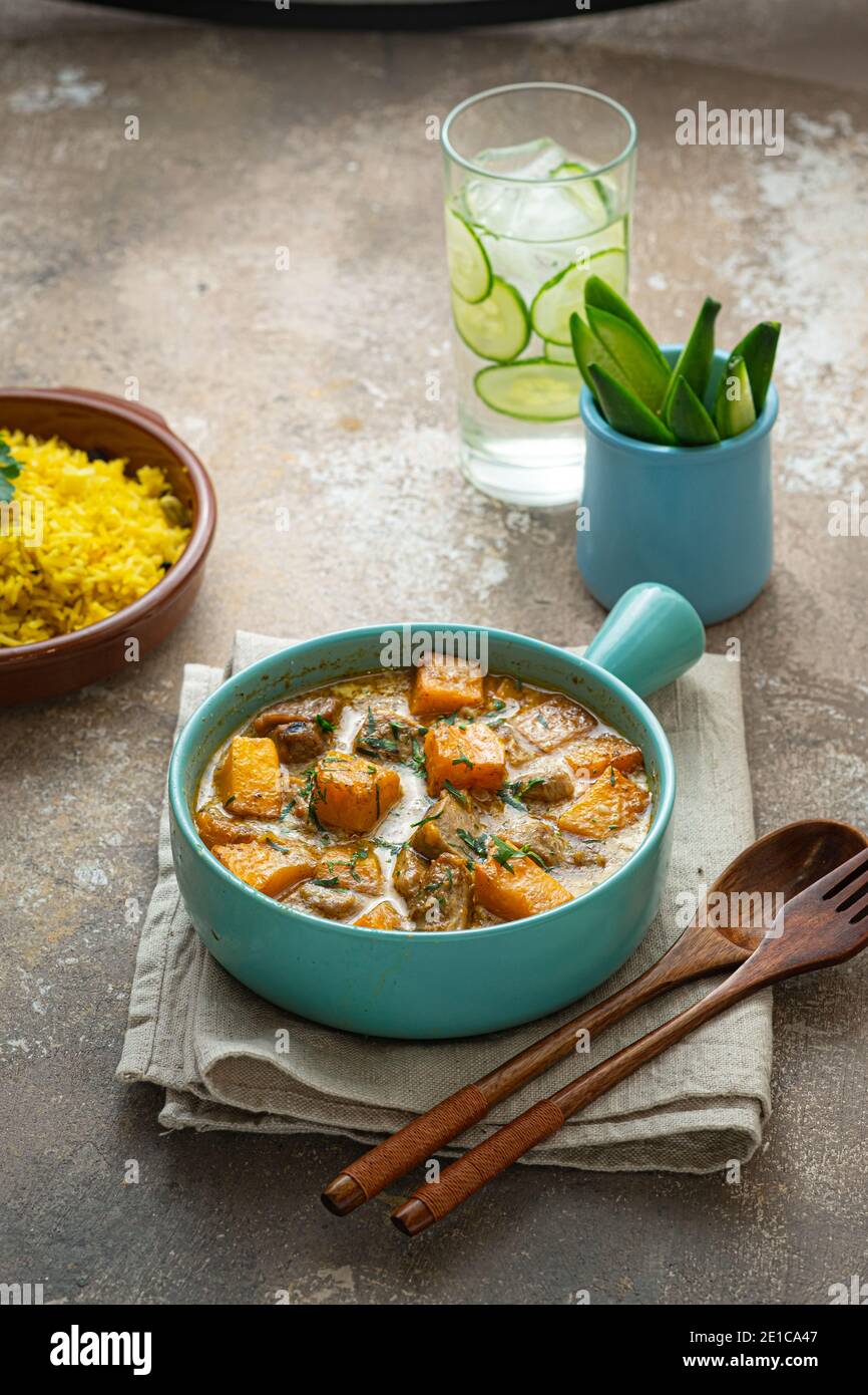 Pumpkin curry with chicken with rice biriani, copy space Stock Photo