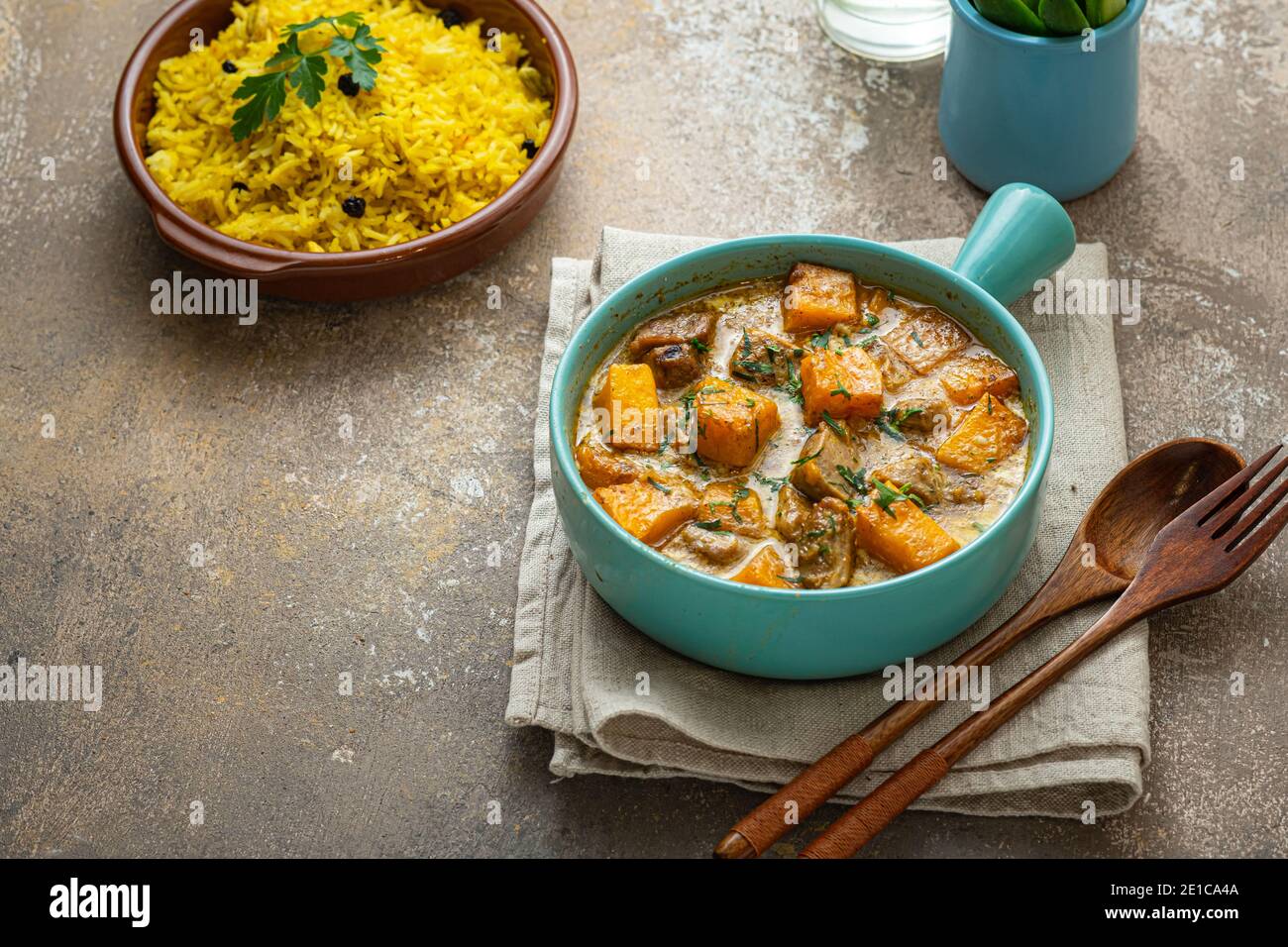 Delicious curry with chicken and rice pilaf, copy space. Stock Photo
