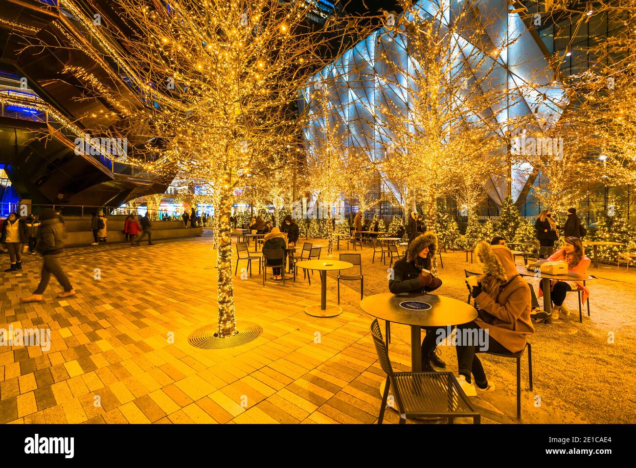 People enjoy watching the Christmas lights at Hudson Yards Stock Photo