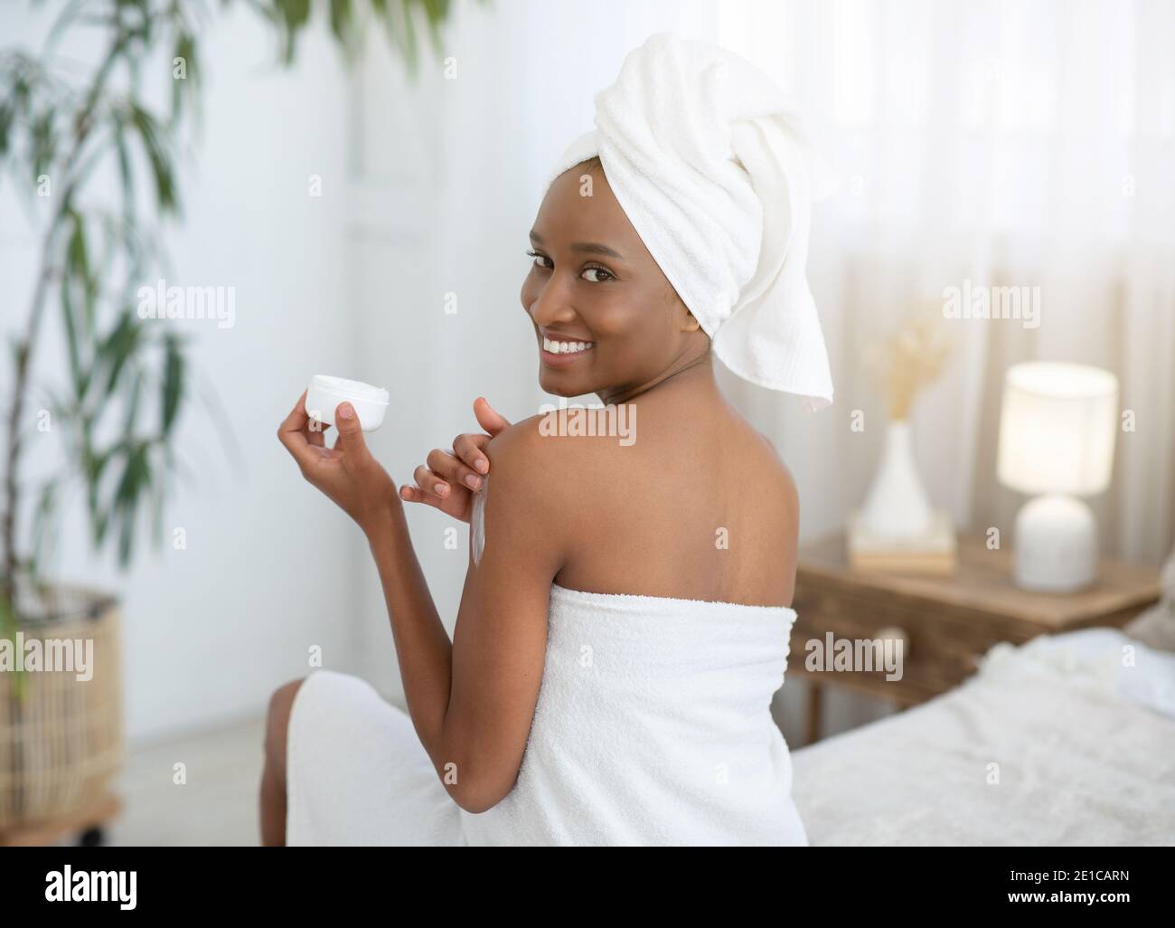 Anti-aging body care, moisturizing and stay at home during lockdown Stock Photo