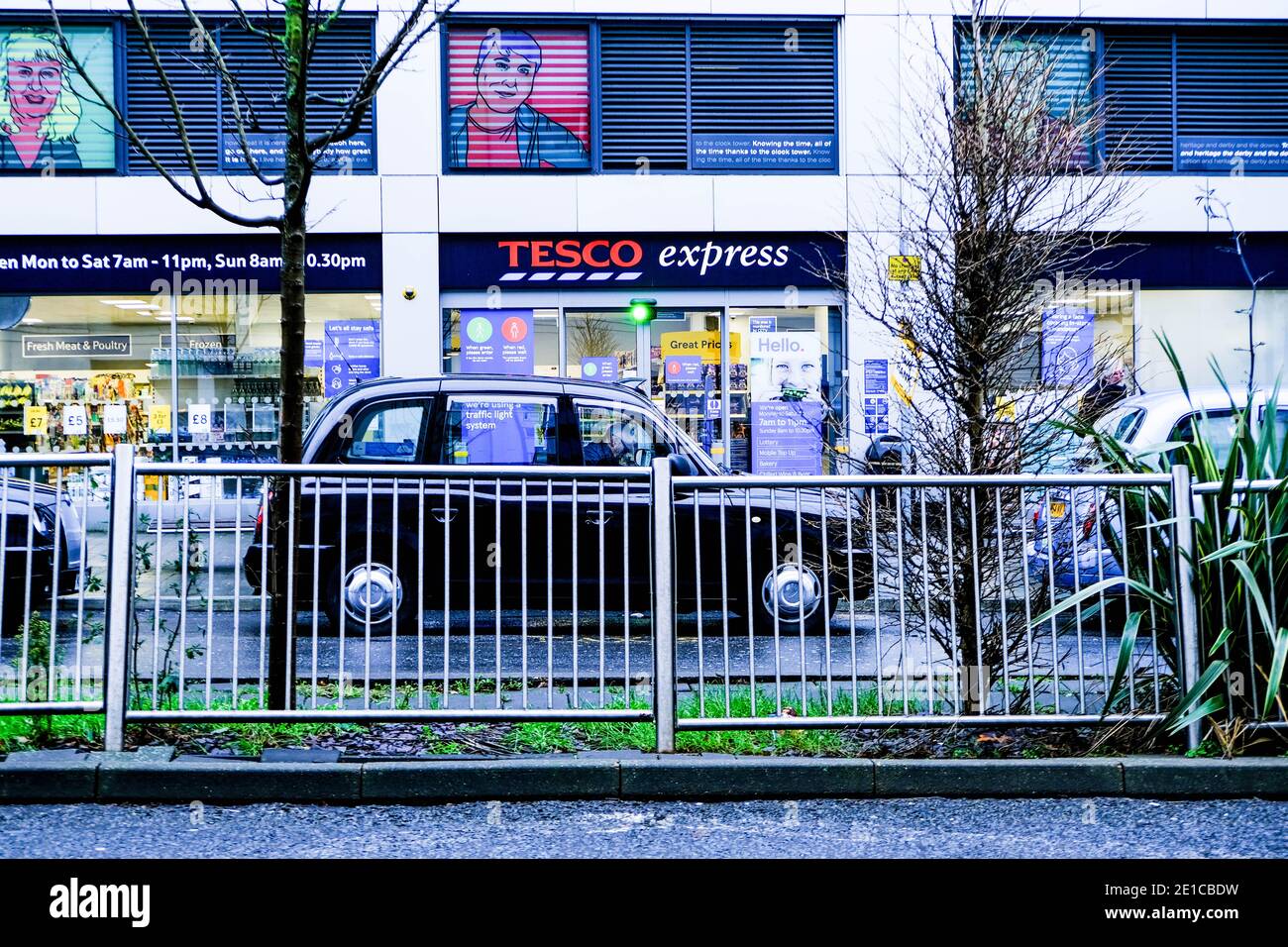 Epsom Surrey, London UK January 06 2021, Tesco Express Convenience Food Supermarket Remaining Open As An Essential Business During Lockdown Stock Photo