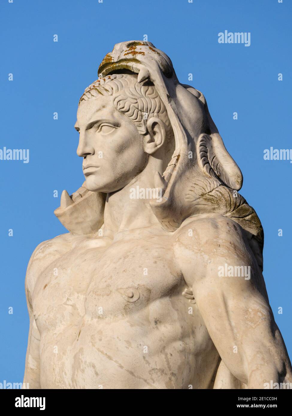 Rome. Italy. Stadio dei Marmi (Stadium of the Marbles), Foro Italico sports complex. Marble statue depicting Rome as Hercules.  The statue was donated Stock Photo