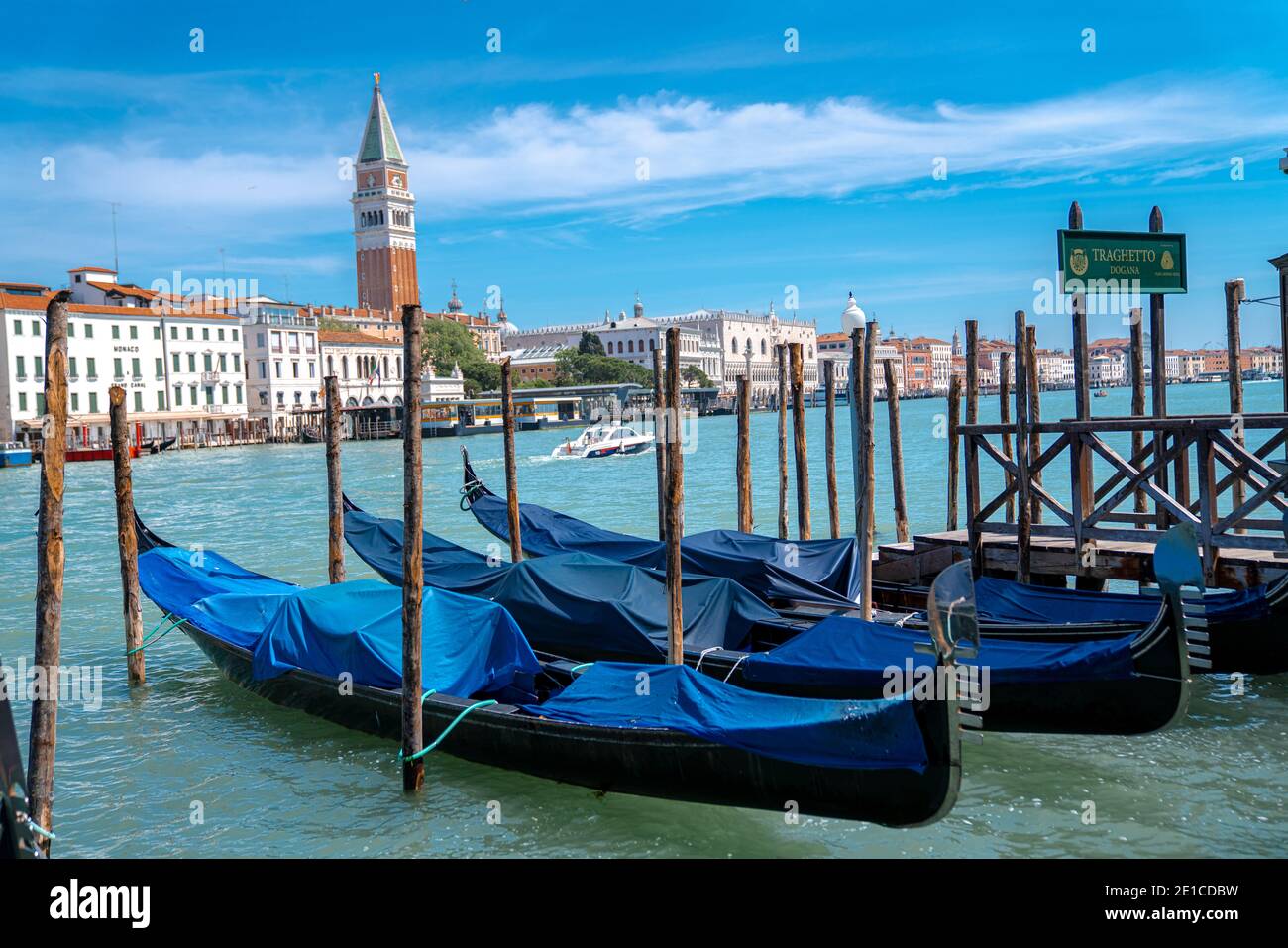 Italian landscape of Venice (Venezia), sunny day on the sea with typical view on canal (water channel). Long exposure method. Stock Photo