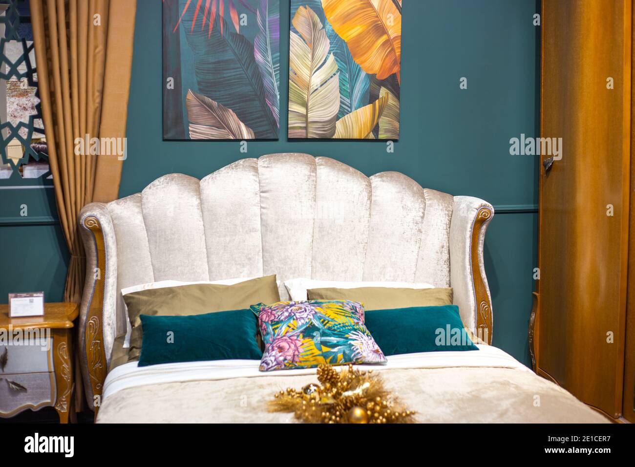 Bedroom interior. Headboard of large bed with many pillows. Furniture store  Stock Photo - Alamy