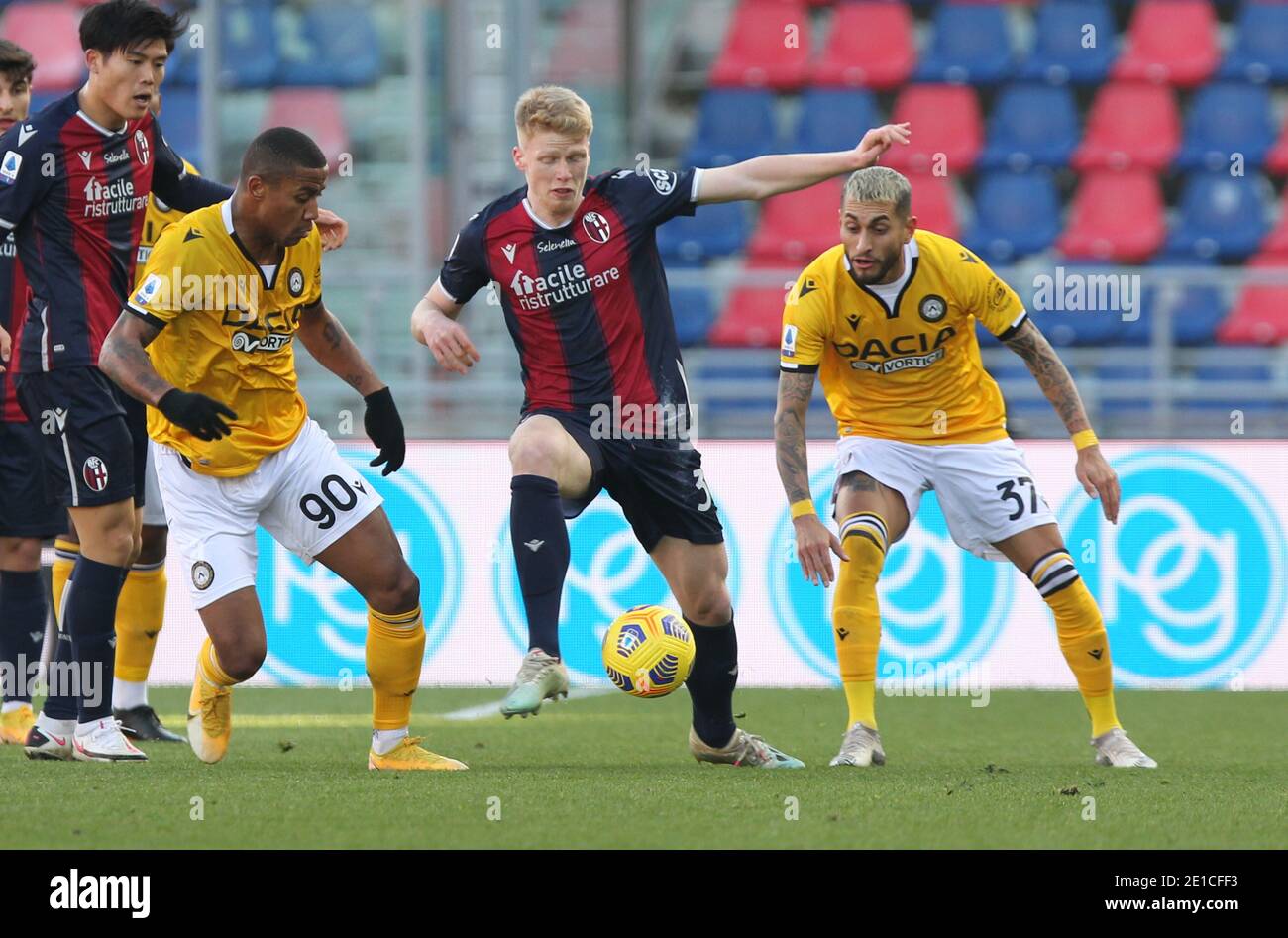 Bologna, Italy. 6th Jan, 2021. Bologna's Jerdy Schouten (C) Udinese's Marvin Zeegelaar (L) and Udinese's Roberto Pereyra (R) during the Italian Serie A soccer match Bologna Fc Udinese at the Renato Dall'Ara stadium in Bologna, Italy, 6 January 2021. Ph. Michele Nucci/LM Credit: Michele Nucci/LPS/ZUMA Wire/Alamy Live News Stock Photo