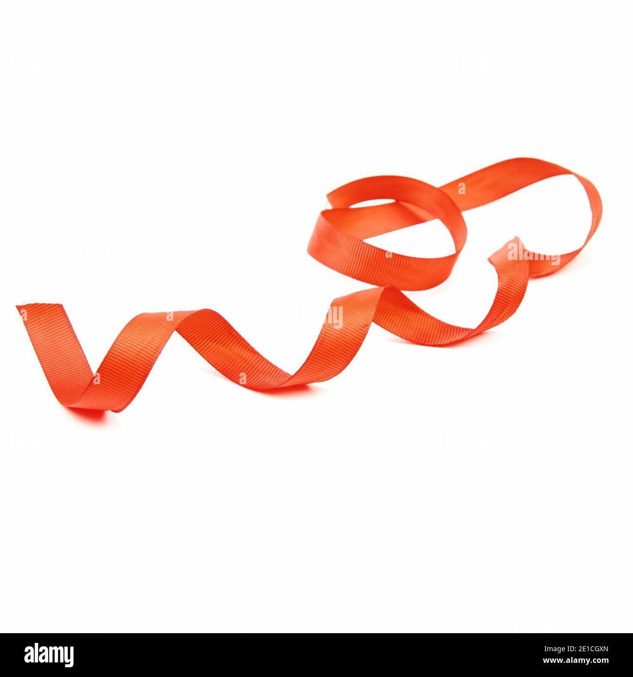 Red curly satin ribbon isolated on white background. Close-up Stock ...