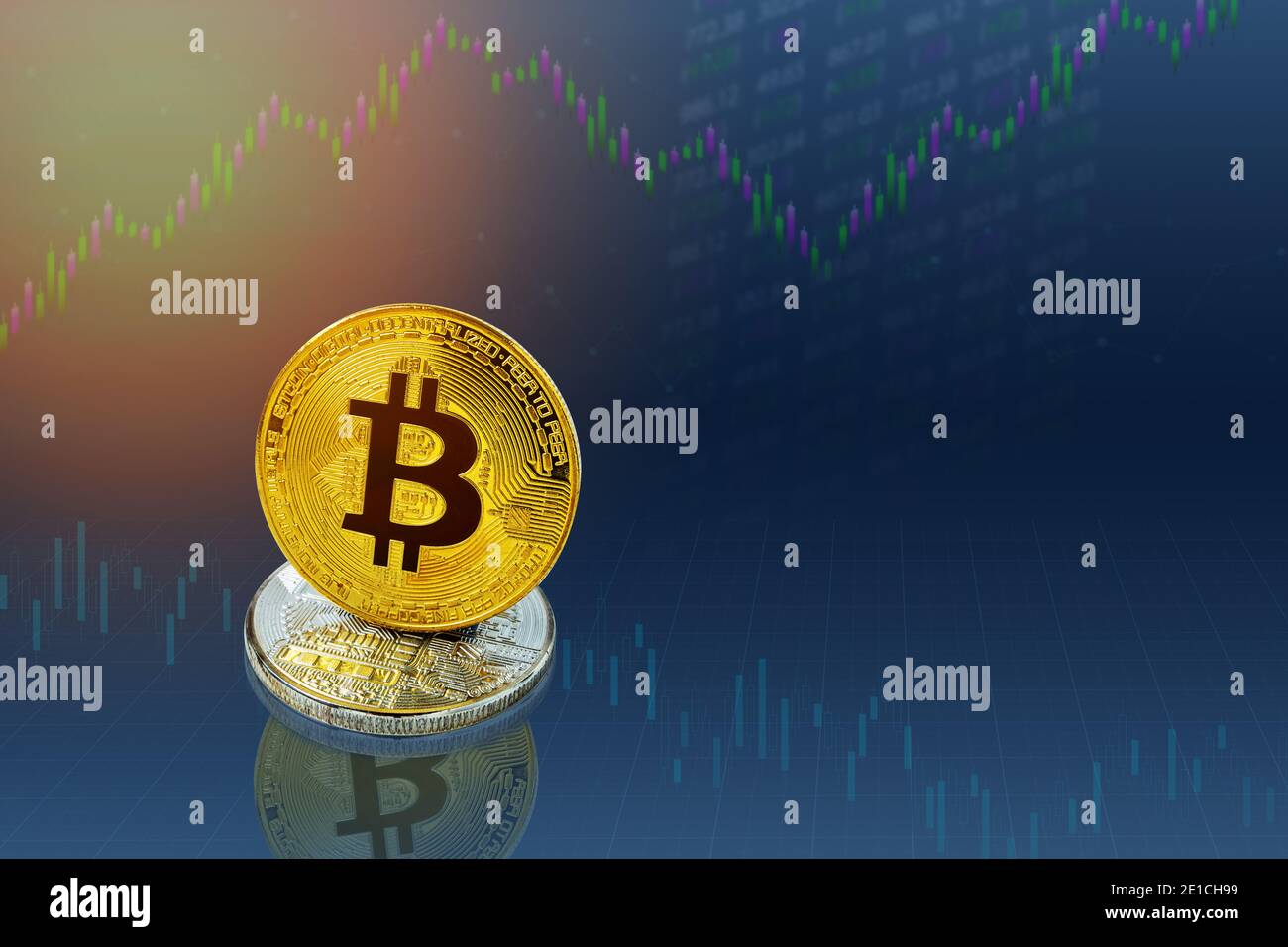 Bitcoins and New Virtual money concept. Gold bitcoins with Candle stick graph chart and digital background. Golden coin with icon letter B or blockcha Stock Photo