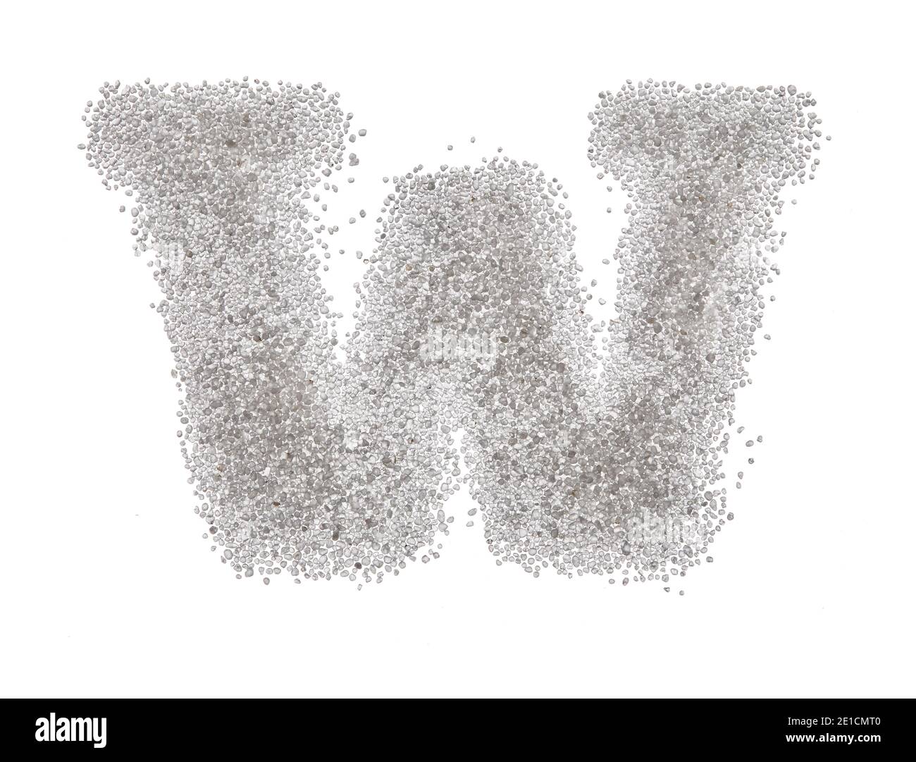 Serif sand letter capital W with soft edges photographed on a white ...