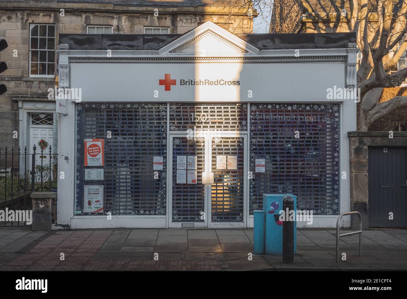 Edinburgh, Scotland - January 6 2021: The British Red Cross shopfront at Raeburn Place in Edinburgh, Scotland one of many charity shops in the area. Stock Photo