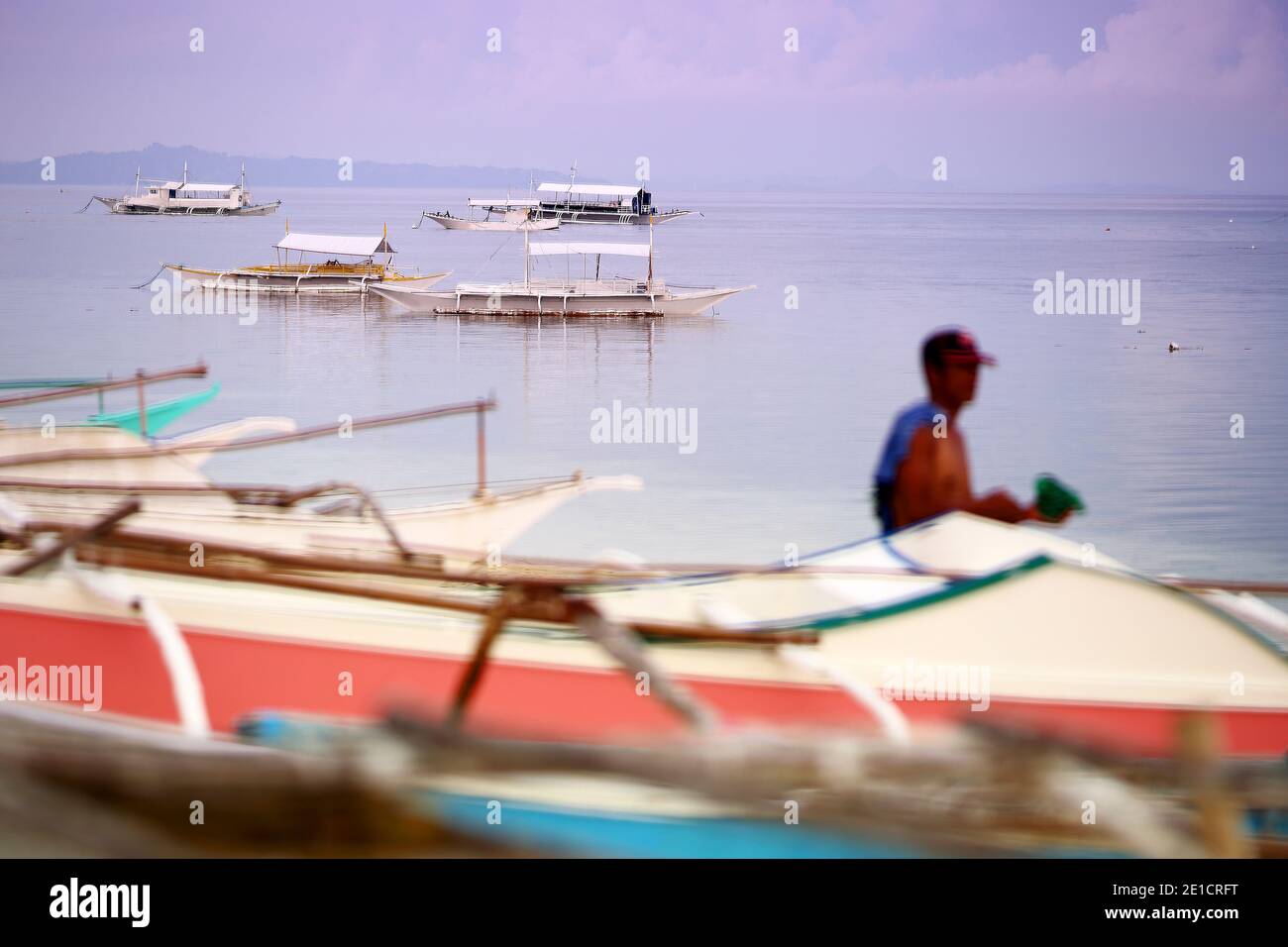 Traditional outrigger fishing boats, MalapascuaÃ‚Â Island, Cebu Province, CentralÃ‚Â Visayas, Philippines Stock Photo